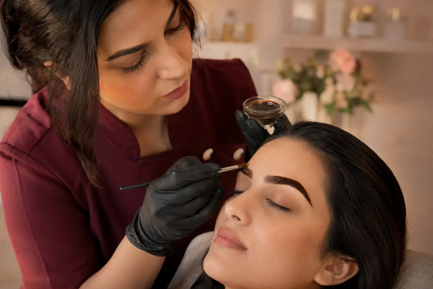 Editorial close-up of henna tint application